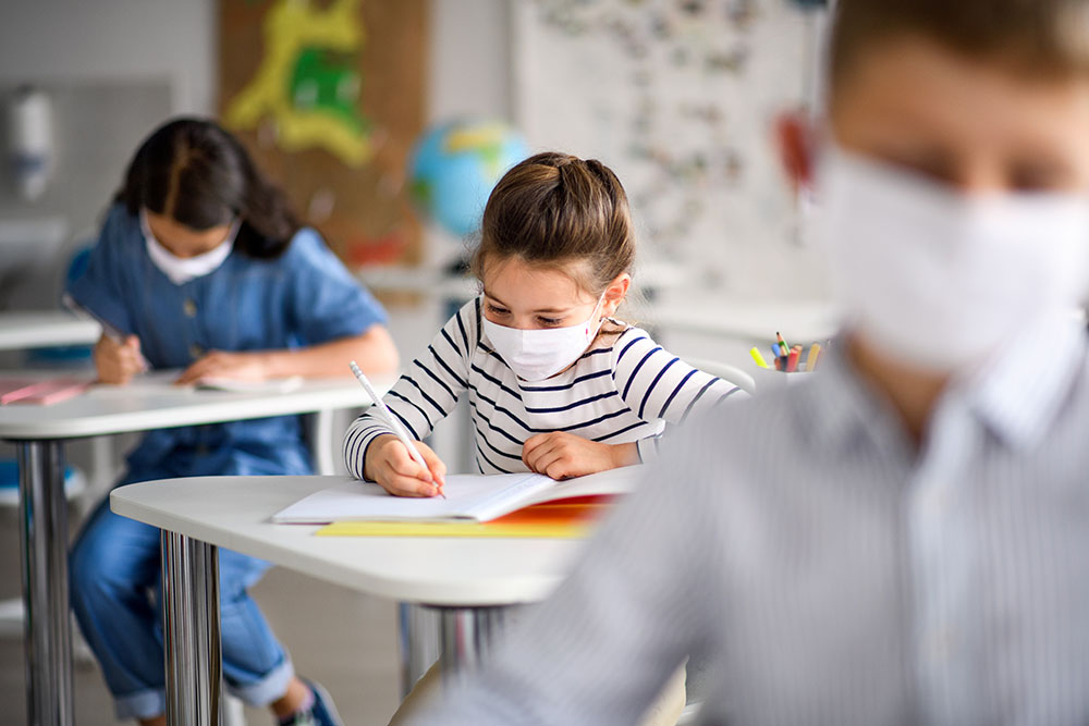 Children with Face Mask On to Protect from Covid